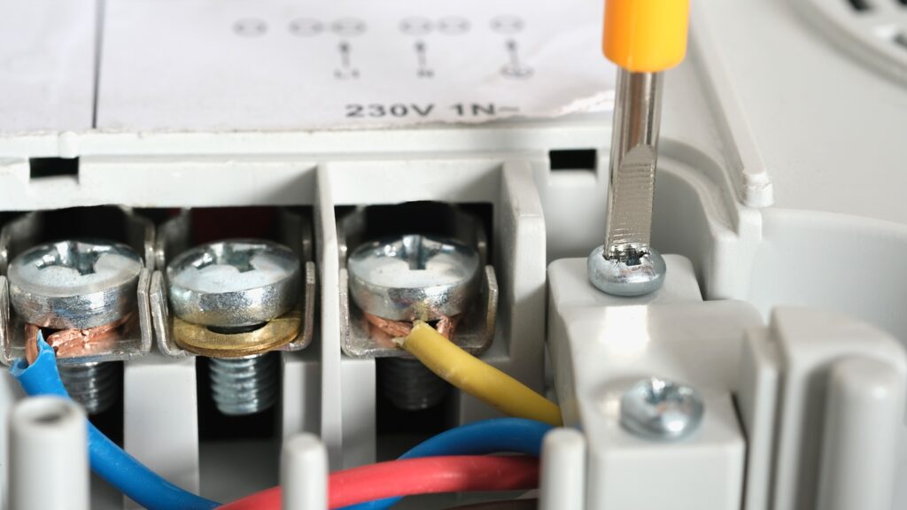 Pofessional wiring and installation hob in the kitchen
